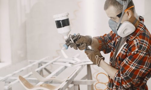master painter factory painting wood with spray gun 1157 45896 1